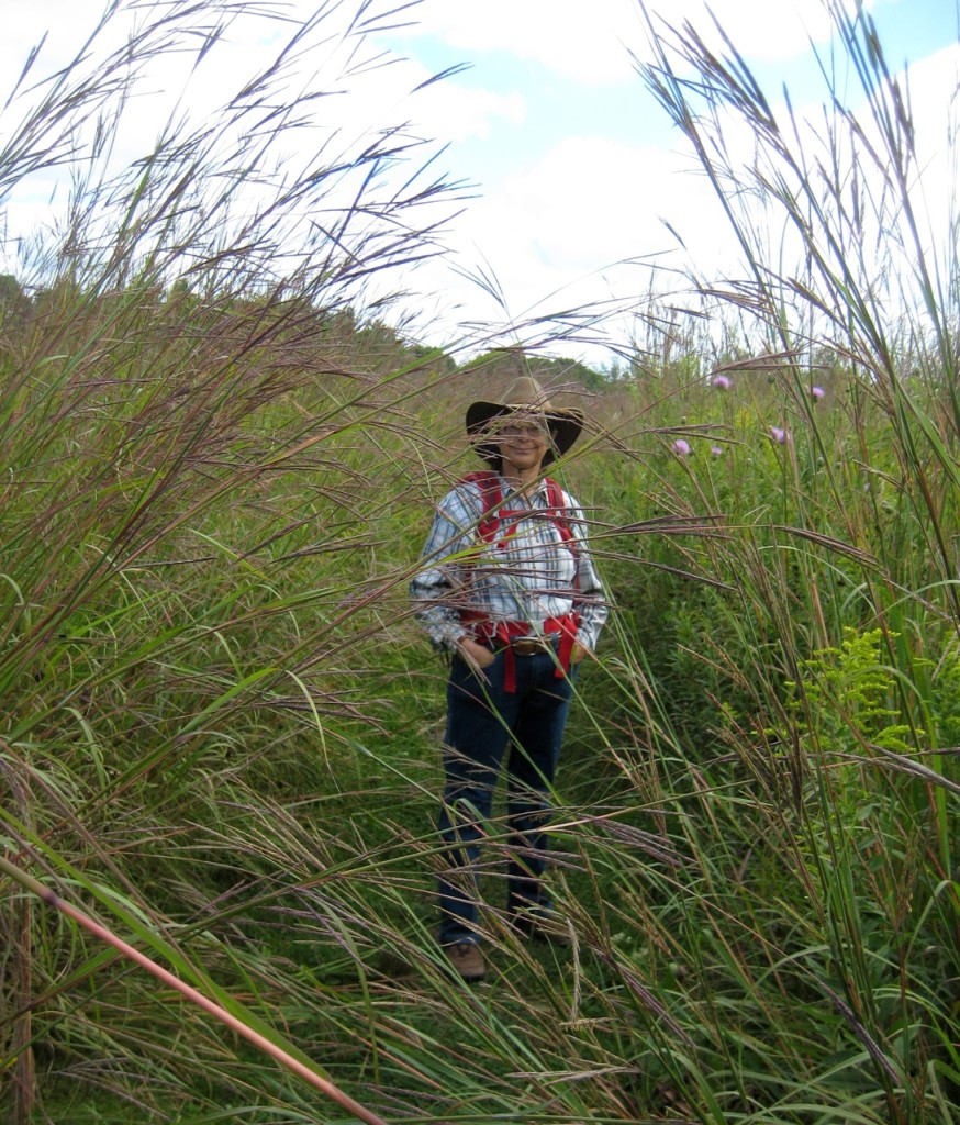 Jackie standing amidst big bluestem