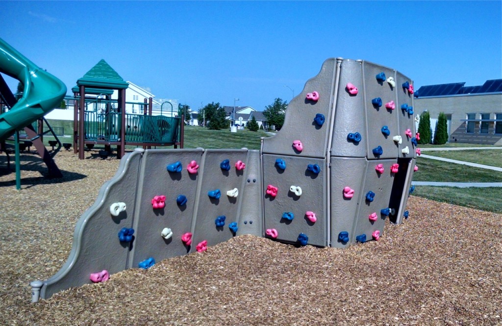 Playground climbing wall and Prairie Fields Park