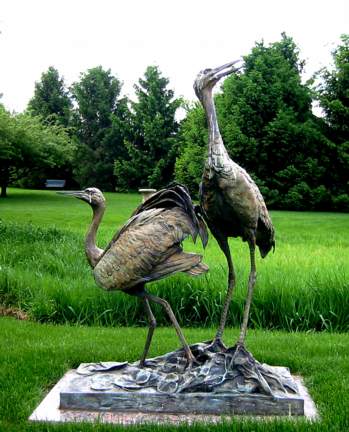 [Sculpture of herons at bus stop on Fox Drive]