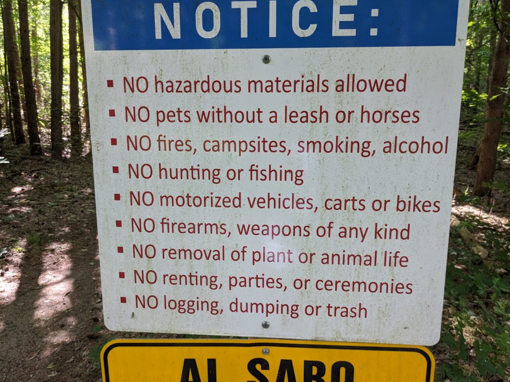 Sign with rules for nature preserve
