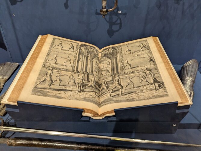 View of copy of Academie de l’Espée in a display case