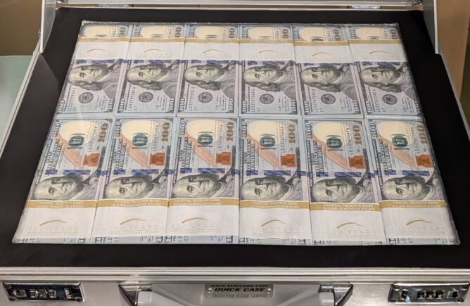 A metal case holding $1 million in $100 bills