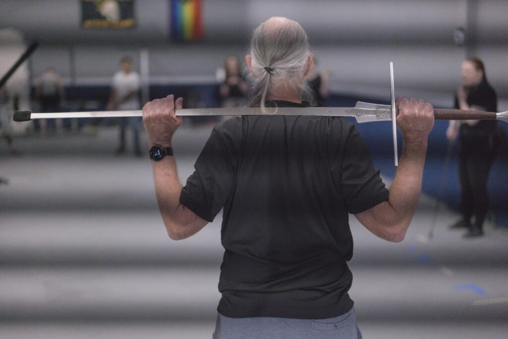 A back view of me with my sword over both shoulders