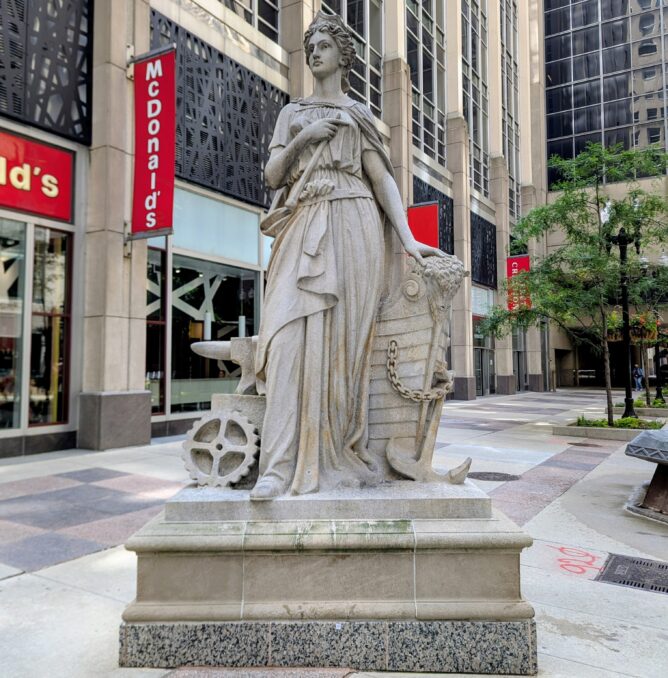 Sculpture of an allegorical figure of Industry, standing outside the Chicago Board of Trade